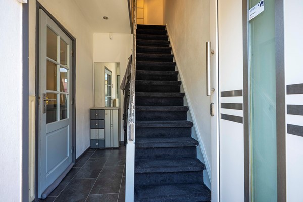 Foto - Te koop: Leuke, uitgebouwde tussenwoning uit 1927 met 3 slaapkamers en garage in de wijk Heksenberg